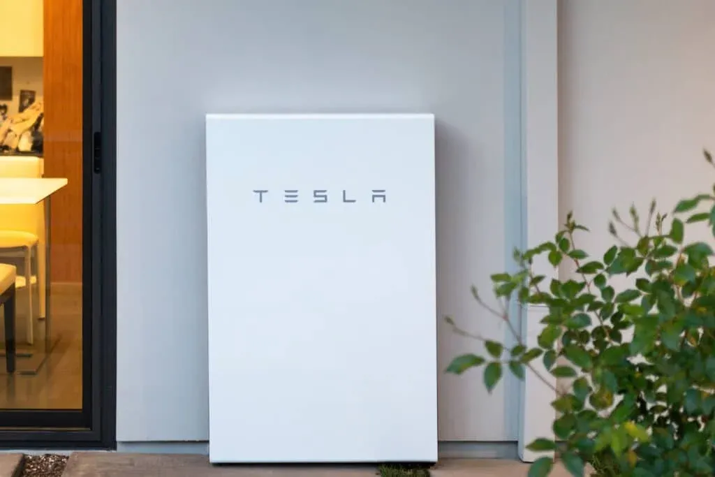 A sleek home battery storage unit mounted on a wall